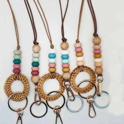 China Customized Handmade Badge Holder Beaded Bohemian Colorful Wood Rattan Nylon Rope Lanyard Keychain for sale