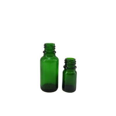 China Essential Oil Cosmetic Green Glass Bottles With Protective Cap Lid Circle Dropper Bottle Or Dropper Screws for sale