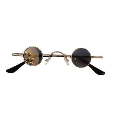 China Small frame men's and women's SUNGLASSES men's and women's sunglasses RETRO fashion glass round punk prince super hip style concave shape hop for sale