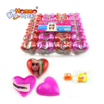 China Capsule Toys Packing PVC Plastic Box Cartoon Heart Shape Surprise Toy Candy With Tattoo for sale