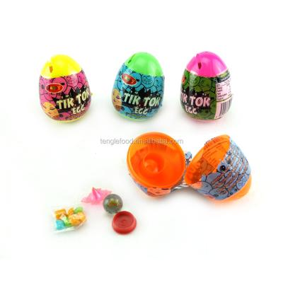 China ST-016 TIK TOK normal tumbler capsule toy plastic surprise egg with small toy and candy for kids for sale