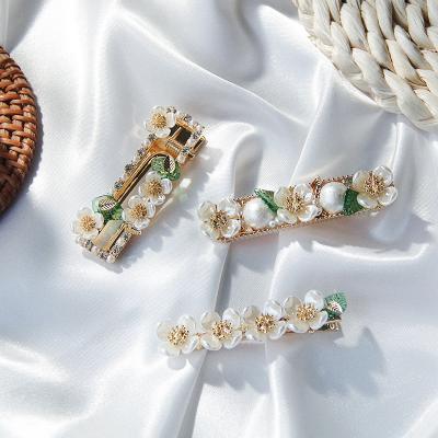 China SFHC0014 Environmental Friendly Hair Accessories Bead Flower Hair Clips For Girls Hair Clip for sale