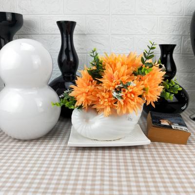 China 2021 design popular silk artificial flower arrangement orange dahlia in Nordic ceramic pot for home decoration 35cm*27cm*25cm for sale