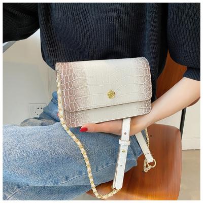 China High Quality Fashion PU Leather Wrap Clutch Bag Serpentine Chain Crossbody Bags Mini Snakeskin Evening Women Shoulder Armpit Bags for sale