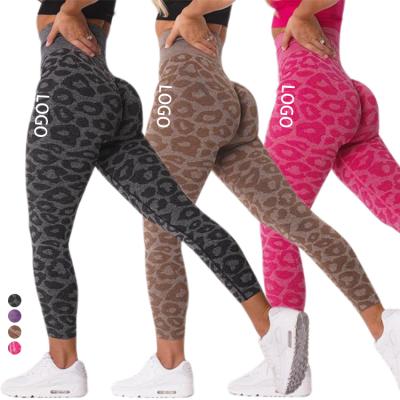 China Breathable customize logo yoga pants seamless highwaist cutout leggings yoga womens outfits leopard print leggings for sale