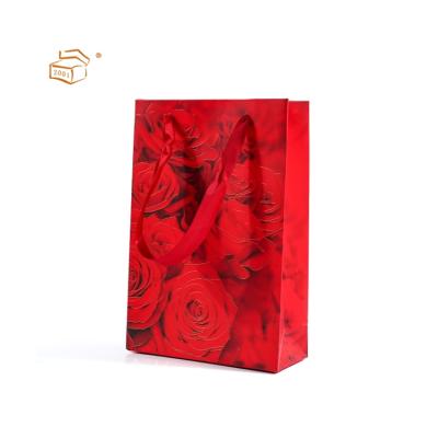 China 2021 Recycled Materials Custom Shopping Gift Practical Paper Bags With Handles for sale