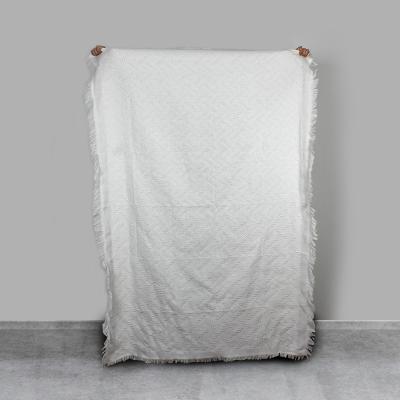 China Cheap white china anti-static wholesale stock design jacquard embroidered tapestry woven blanket double for sale