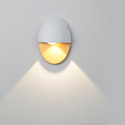 China Aluminum oval black or white led wall lamp with 10W warm whtie 3000k white 6000k wall sconce light yard lighting for sale