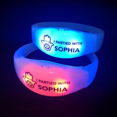 China Concerts and Festival Smart Small Rubber Silicone Parties Printing Custom Logo Sound Motion Active Flashing Wristband for Event for sale