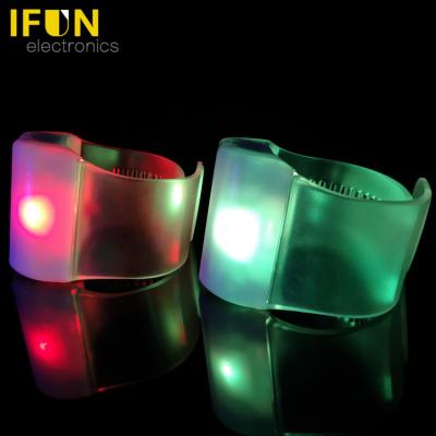 China ABS case+PVC strip event party supplies 3*AAA batteries powered high luminous RGB 3 LED remote control wristband with logo for sale