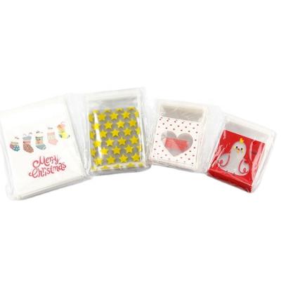 China 100pcs/set Dots Plastic Christmas Gift Bag ANTISTATIC White Transparent Cookie Candy Packaging Bag for sale