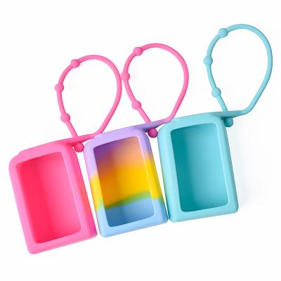 China Personal Care Wholesale Mini Reusable Portable Travel Sized Cute Chain Carriers 30ml Hand Sanitizer Bottle Silicone Head Holder for sale