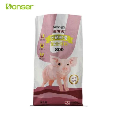 China Custom Moisture Proof Animal Feed Packing Bag With PP Woven Printed Plastic Pig Feed for sale