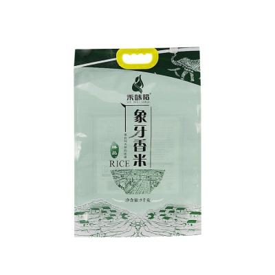 China Recyclable 100% natural rice plastic bag with handle ivory rice vacuum packing bag for supermarket package for sale