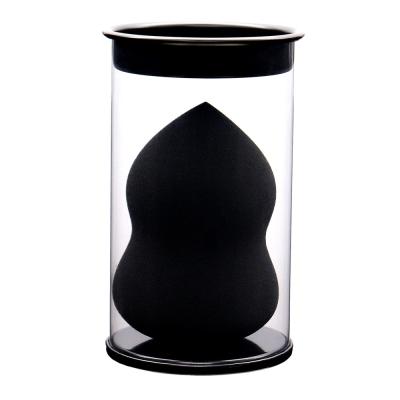 China Black Sponge Black Mark Cylinder Pack Beauty Egg Water Drop Breathtaking Three Joint Makeup Sponge Face for sale