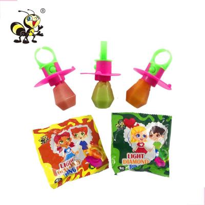 China Promotional Toys Promotional Toys with Shaped Noise Shape Pop Toys Diamond Ring Candy Light Funny Hard Candy Halal Toys for sale