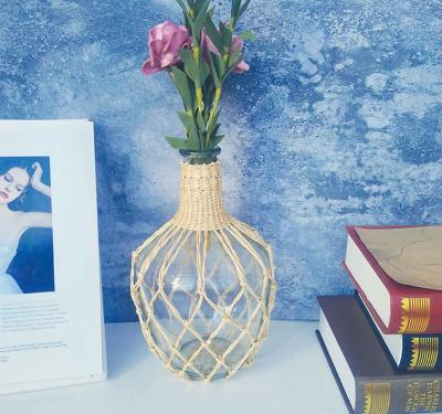 China New classic/postmodern Japanese style creative rattan vase glass flower vase with rattan stand export for sale