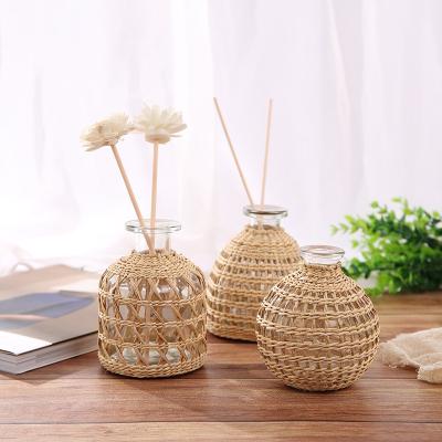 China New Creative Classical/Postmodern Ins Style Glass Bottle With Rattan For Flower Aromatherapy Glass Bottle With Rattan for sale