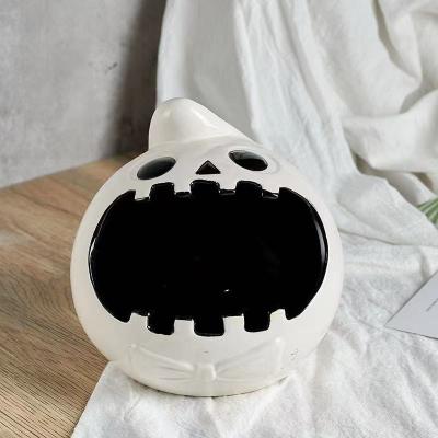 China Pumpkin and Ghost Heatable Ceramic Cartoon Halloween Candy Jar for sale