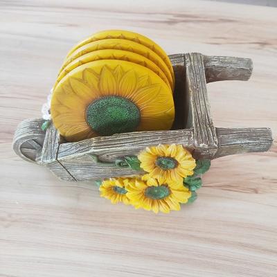 China 2019 Viable New Resin Sunflower Coaster Cup Carpet Trolley Coaster for sale