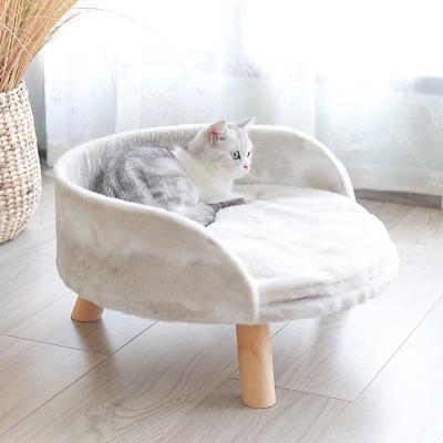 China Travel Luxury Winter Plush Nest Solid Wood Cat Bed Dog Stool Climbing Warm Frame Pet Furniture Sofa for sale