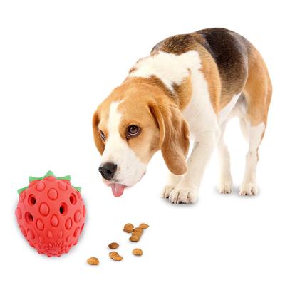 China Viable Wholesale IQ Shaping Natural Rubber Cutter Shape Dog Treat Dispenser Ball Chew Toy for sale