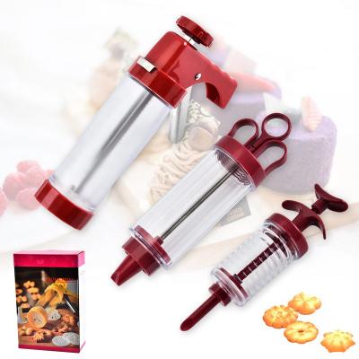 China Viable Wholesale Baking Set Small Biscuit Holder Gun Tool Cream Flower Holder Tip Kitchen Tools for sale