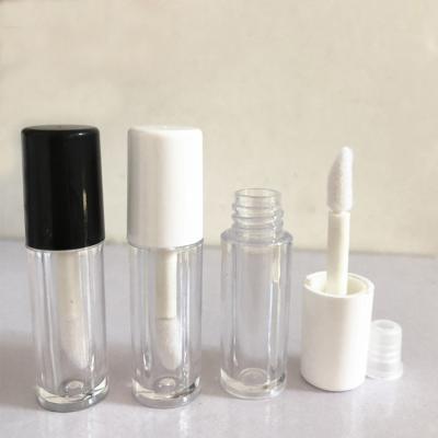 China 1.3 Cosmetics Mini Empty Black White Lip Gloss Tube With Magic Wands Packaging Lip Gloss With Brush Lip Gloss Containers Tube for sale