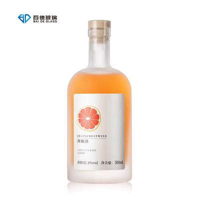 China Beverage BAIDE Stock 200ml 375ml 500ml 1000ml Clear Empty Custom vodka bottle 750ml for Vodka Liquor Wine for sale