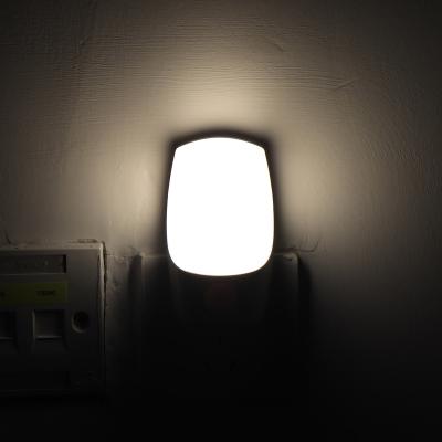 China Modern OEM LED Motion Sensor Night Light Wall Lamp Plug In Device for sale