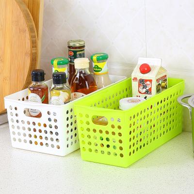 China Folding Universal PP Fruit Bottle Basket Rack Cabinet Storage Rack For Drinks White Cavity Plastic Portable Storage Basket With Handle for sale