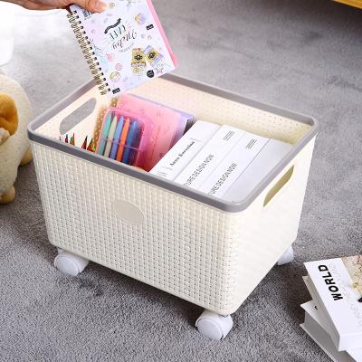 China Creative Folding House PP Hollow Out Portable Universal Storage Rack Toy Book Basket Snack Food Storage Basket With Wheels for sale