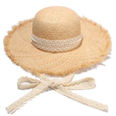 China Cozy Women Beach Sun Hat Handwoven Lace Straw Hat New Streamer Raffia Straw Hat Seaside Holiday for sale