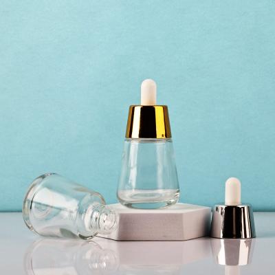 China 30ml 50ml Essential Oil Cosmetic Products Transparent Glass Dropper Refillable Bottle With Gold Cap for sale