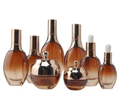 China High End Cosmetic Glass Packaging Rose Gold Cosmetic Bottles Set OEM Private Label Eye Serum Glass Bottle OEM for sale