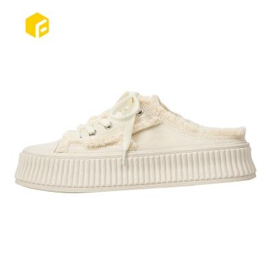 China Fashion Trend 2022 New Design Canvas Shoes Wide Fit Unique Thick Flats Roll Mules Shoes For Women for sale