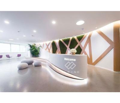 China Office Counter Joint Unique Design Seamless Curved Artificial Marble Reception Desk With Led Light for sale