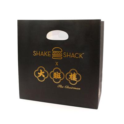 China Manufacturer Custom Print Black Recyclable Garment Packaging Luxury Boutique Gift Shopping Paper Bag With Handles for sale