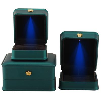 China LED Light Jewelry Box for Custom Luxury Crown Jewelry Packaging Plastic Velvet Material for sale