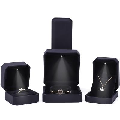 China Newest Custom Logo LED Jewelry Display Box for Rings Necklaces Bracelets and Earrings for sale