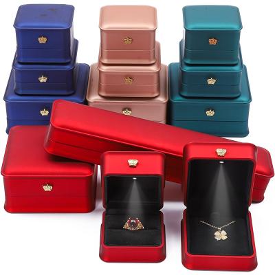 China Golden Crown Led Light Jewellery Box For Necklace Bracelet Ring Earrings Packaging for sale