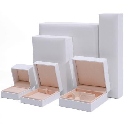 China Custom 9x9x4cm Jewelry White Paper Box for Bracelet Earrings Necklace Ring Packaging for sale