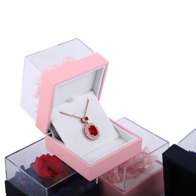 China Caja de embalaje de joyas de flores de rosa cuadrada Caja de anillo floral para regalo Diseño personalizado en venta