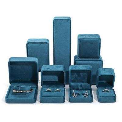 China Custom Logo Dark Blue Sleek Velvet Jewelry Gift Boxes For Luxury Packaging for sale