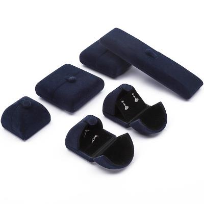 China Dark Blue Clamshell Shaped Velvet Jewelry Storage Case Jewellry Packaging Box for sale