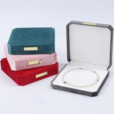 China Soft Touch Multi Color Velvet Pearl Necklace Storage Box With Golden Scutcheon for sale