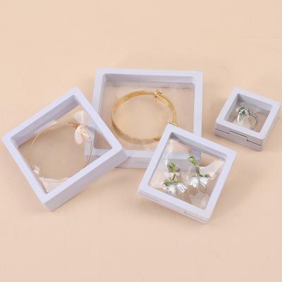 China Plain White PE Membrane Suspension Box Plastic Floating Jewelry Case Transparent for sale