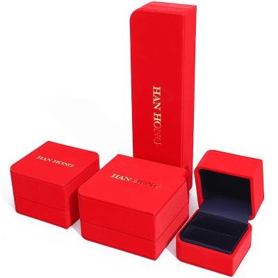 China Red Arc Diamond-Shaped PU Leather Jewelry Box Velvet Lining for Luxury Packaging for sale