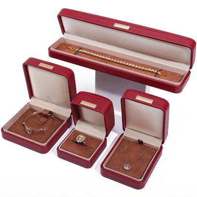 China Floating Effect Red PU Leather Luxury Jewelry Packaging Box Set with Gold Bar for sale