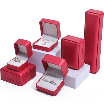 China Noble Red PU Leather Luxury Jewelry Packaging Box Set with Soft Velvet Lining for sale